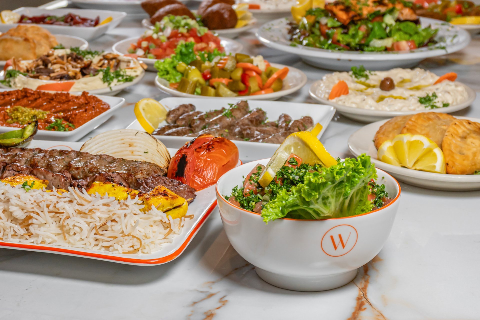 Wasfi’s grilled kabobs, rice, hummos, baba ghanouj and fresh salads, ready to share